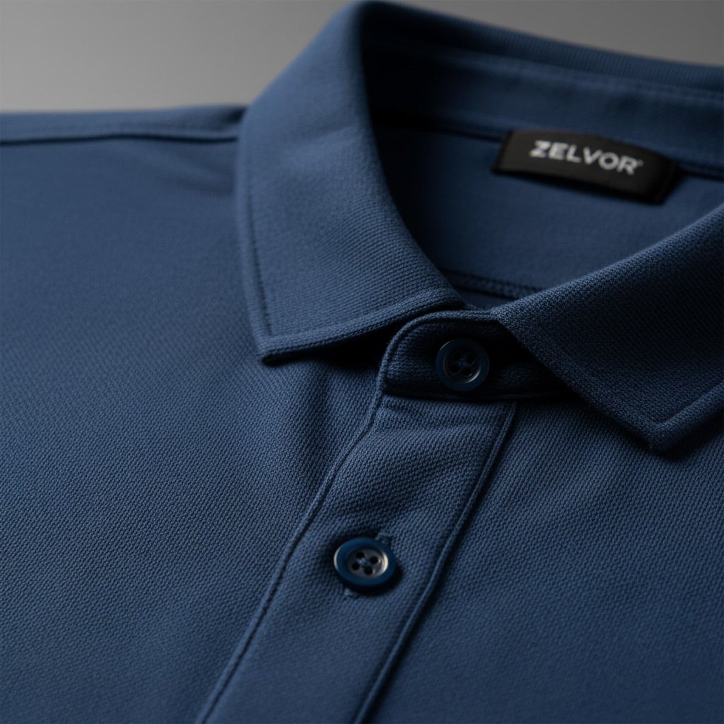 Chomba ZELVOR Essential Piqué – Azul Petróleo.