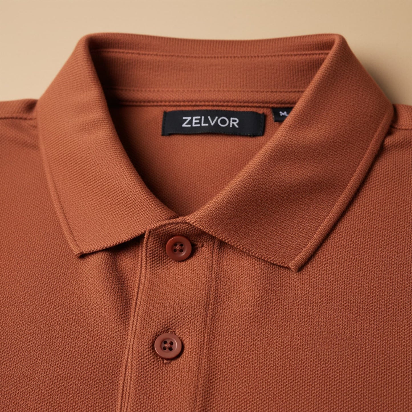 Chomba ZELVOR Essential Piqué – Rojo Terracota