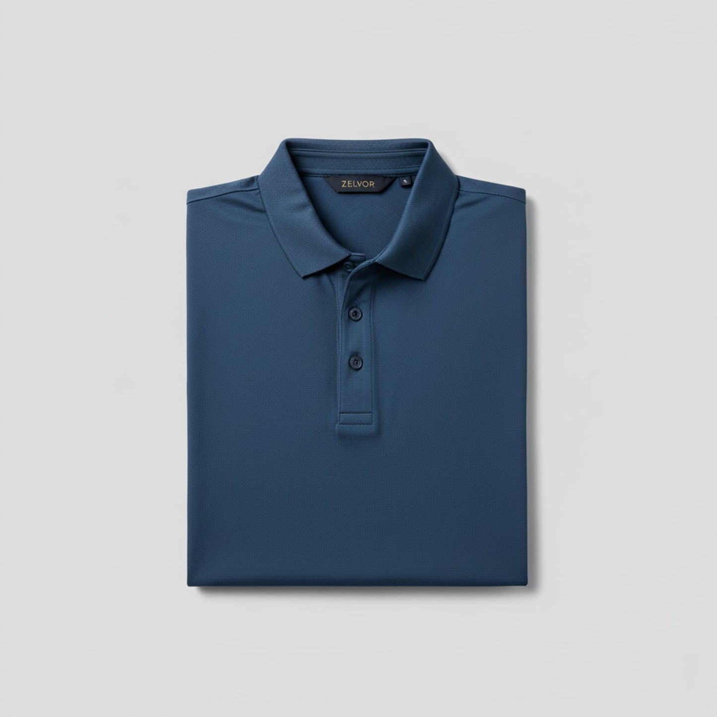 Chomba ZELVOR Essential Piqué – Azul Petróleo.